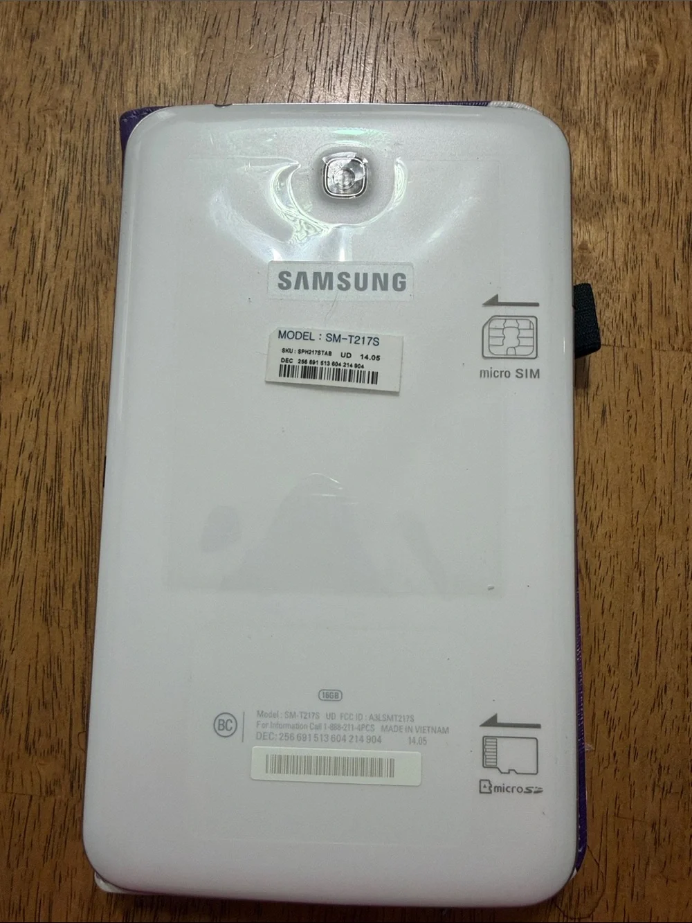 Samsung Galaxy Tab 3 White Tablet with Purple Cover Accent